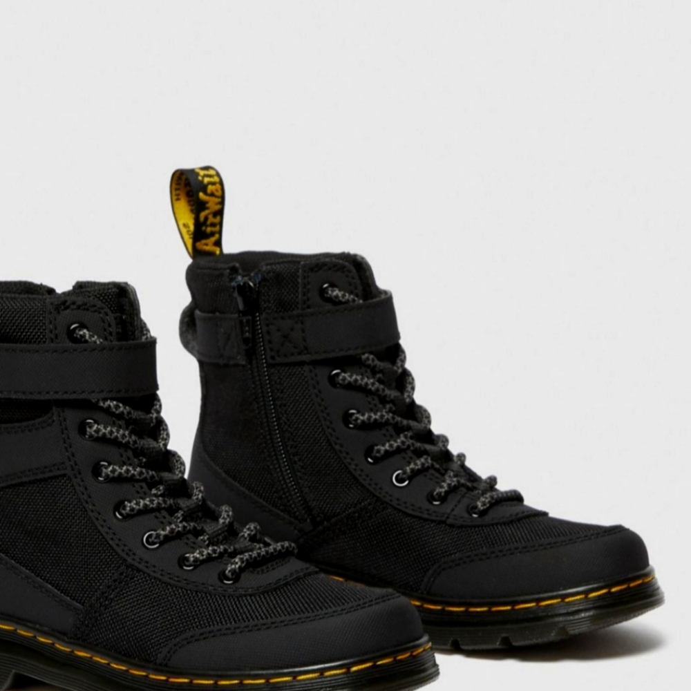 Dr. Martens combs tech J boots.